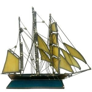 Stained Glass Staysail Sailing Ship The base‎ has the ship sailing blue ocean